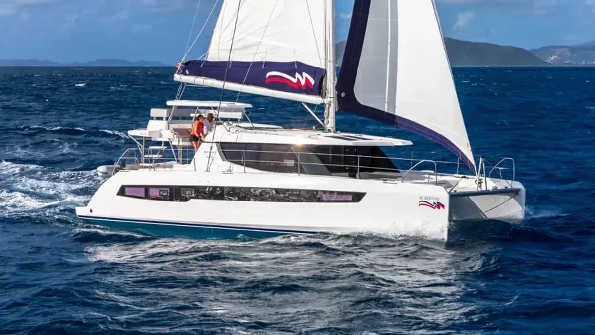 Aerial view of a Leopard catamaran sailing in the Caribbean