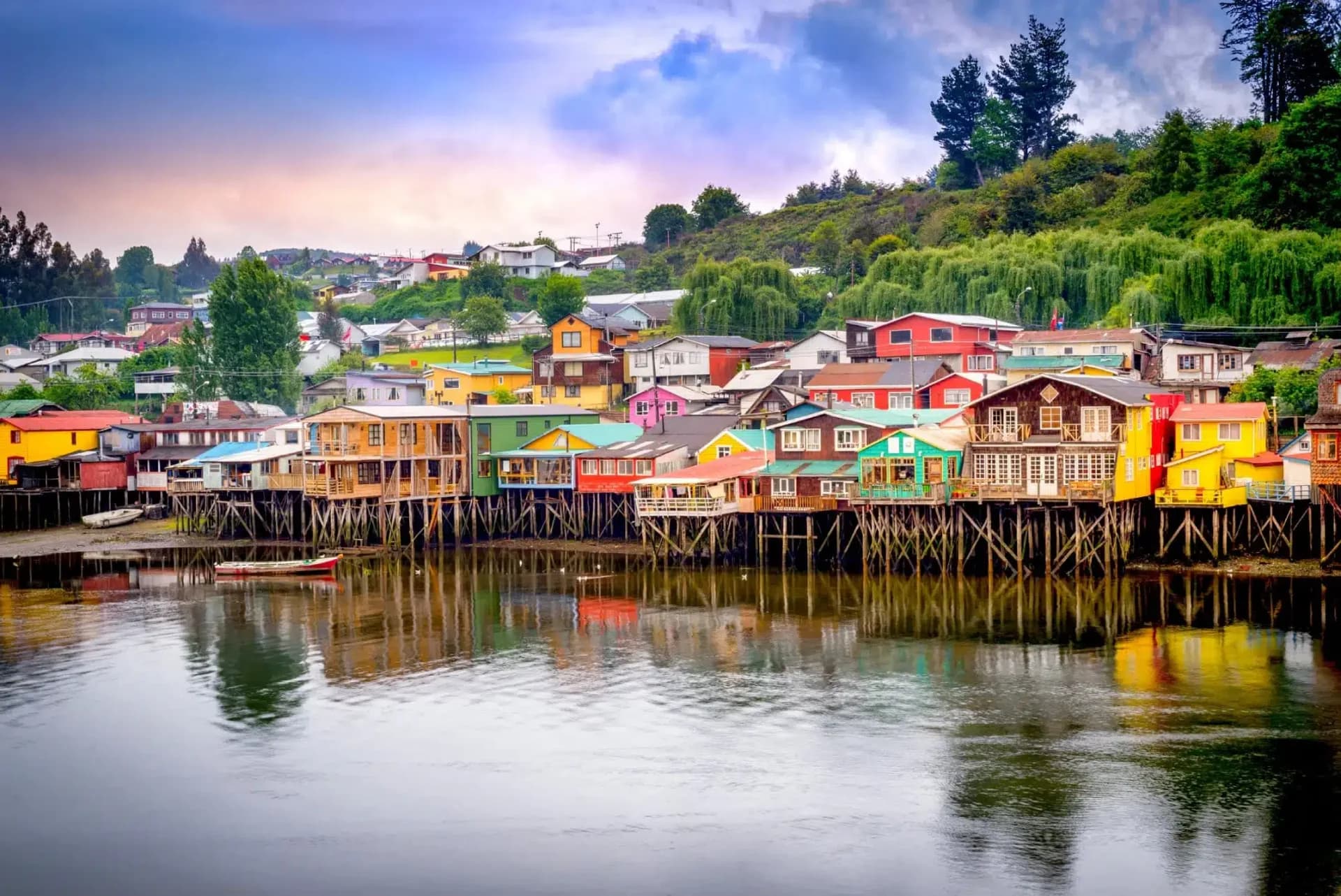 Colorful wooden houses on stilts in a Patagonian fishing village