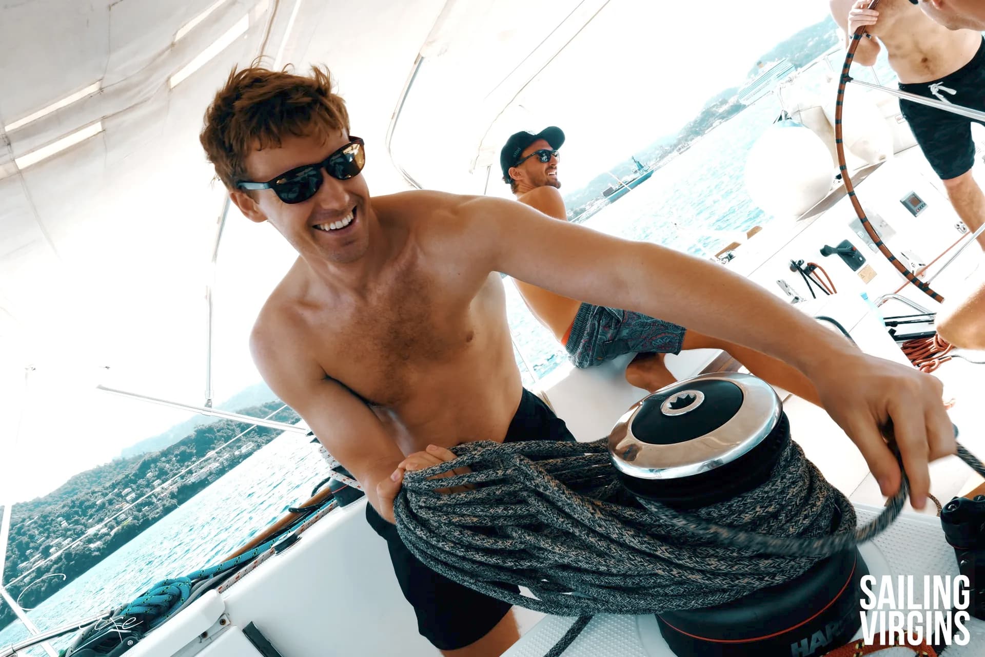 Student smiling while winching on deck