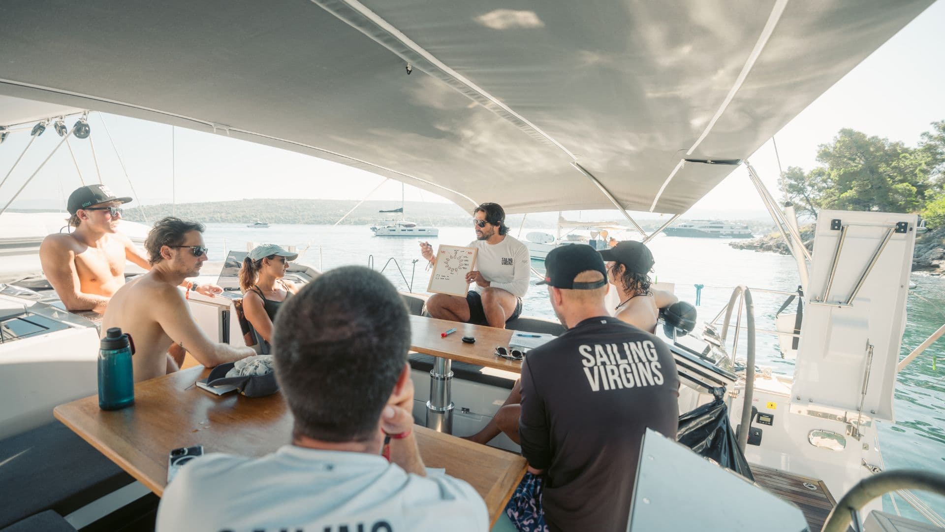 Beginner sailors learning to sail in stunning Caribbean waters