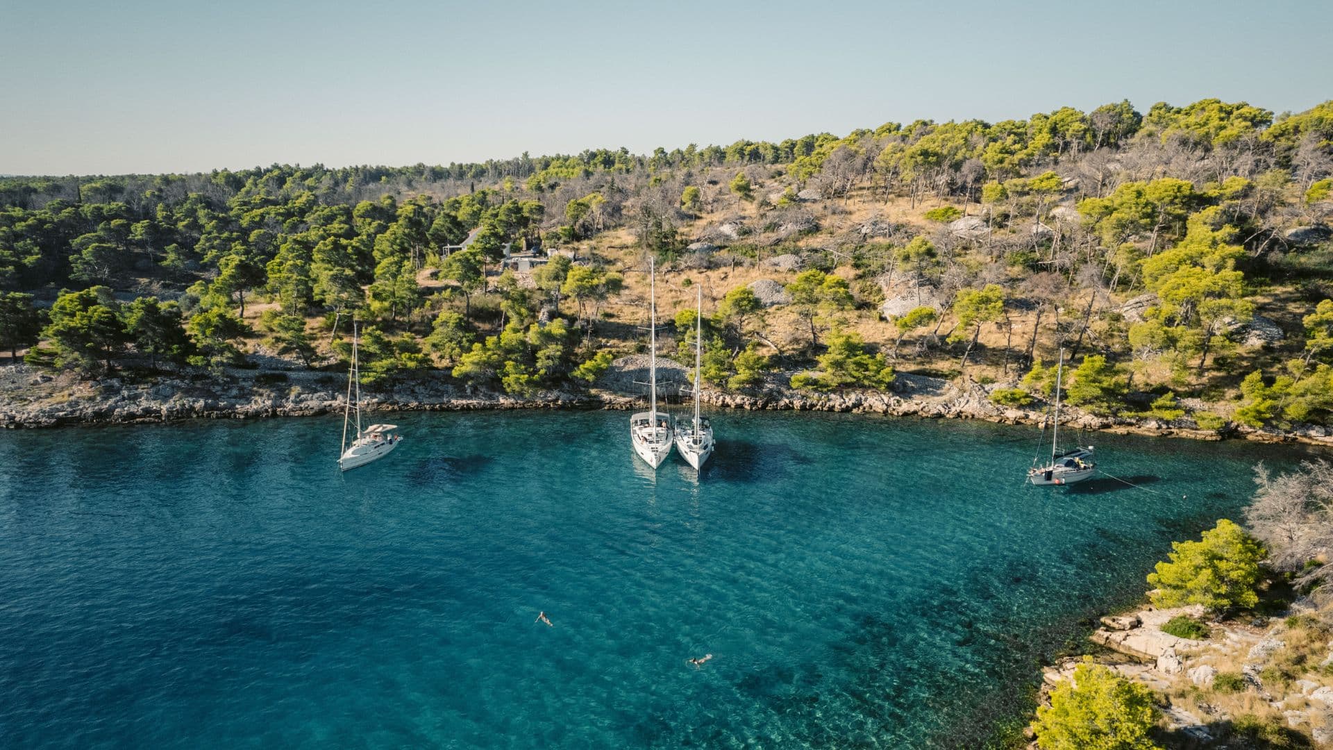 Monohull sailing through beautiful waters