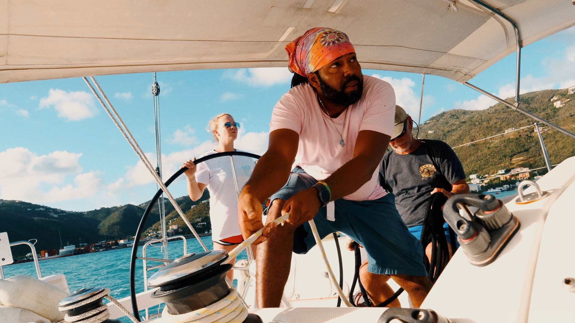Students practicing sail trim on a catamaran